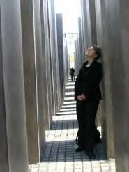Woman standing in the Memorial for Murdered Jews of Europe