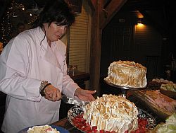 Rebecca Rather icing a cake